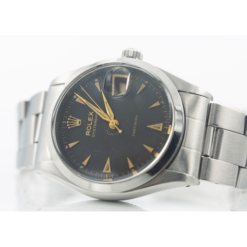 215 - 1953 ROLEX OYSTER PRECISION WATCHRolex Oyster Precision steel-cased gentleman’s wristwatch with sign... 