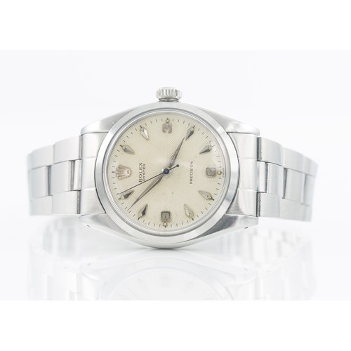 216 - 1956 ROLEX OYSTER WATCHA 1956 Rolex Oyster with 'Herringbone’ tropical chevron dial and cross hair d... 