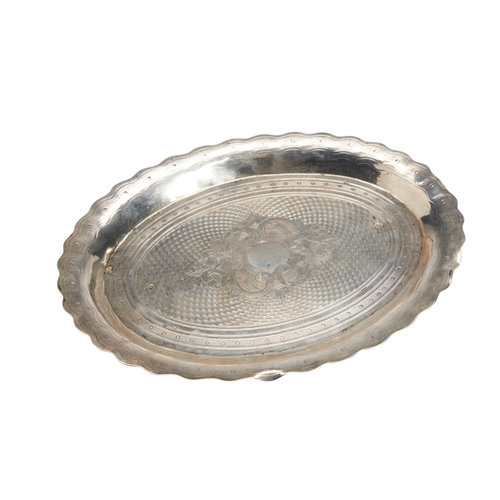 1 - AN OTTOMAN TURKISH OVAL SILVER DISH, C.1890 With machine engraved decoration around a vacant escutch... 