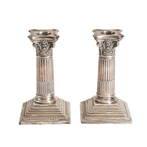 60 - PAIR OF DWARF CORINTHIAN COLUMN CANDLESTICKS C.1900 Made by Walker & Hall15.5 cm