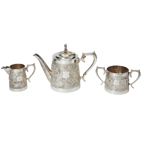 127 - THREE PIECE STRAIGHT SIDED CHASED TEASET, MONOHUR DUTT, CALCUTTA C.1910 Well chased with village sce... 