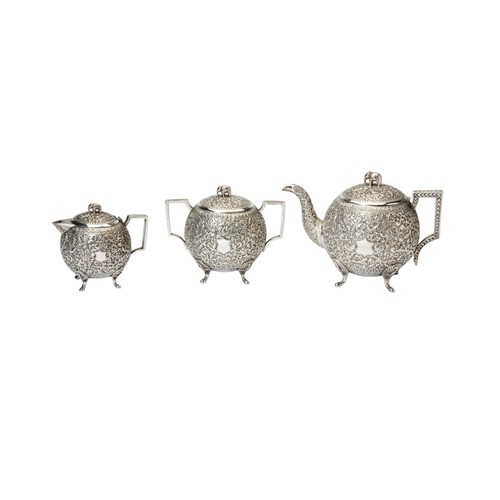 126 - THREE PIECE GLOBULAR TEASET, BHUJ KUTCH C.1900 Chased all over with scrolls in typical Kutch style. ... 