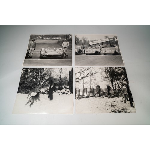 62 - 11 LARGE FORMAT PHOTO CONTACT SHEETS DEPICTING JOHN SURTEESAt home with his dogs playing in the snow... 