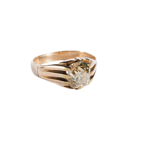 217 - A LATE VICTORIAN GOLD AND DIAMOND RING, the old cushion-cut diamond claw set above split shoulders, ... 