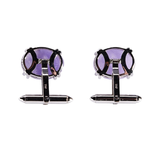 250 - A PAIR OF LAVENDER JADE CABOCHON STONES of rich, strong colour, set in 18k white gold cuff links, ap... 