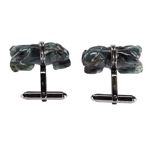 258 - PAIR OF SPINACH GREEN JADE STONES WITH BLACK INCLUSIONS DEPICTING OXEN, mounted in 18k gold cuff lin... 