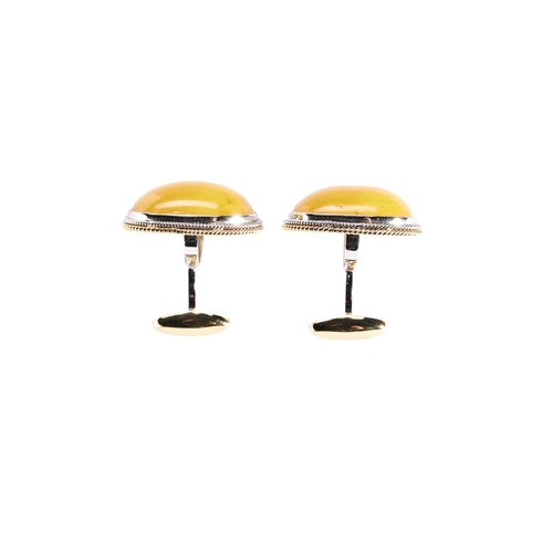 263 - PAIR OF BUDDHIST AMBER CABOUCHON CUFF LINKS mounted in 18k white and yellow gold, approx 3cm, total ... 