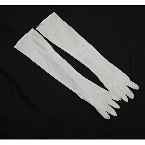 397 - A COLLECTION OF GLOVES, MAINLY 19TH CENTURY; a pair of ladies cotton long sleeved gloves.anda simila... 