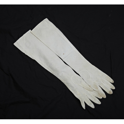 397 - A COLLECTION OF GLOVES, MAINLY 19TH CENTURY; a pair of ladies cotton long sleeved gloves.anda simila... 