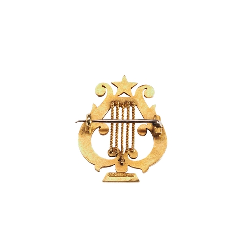 228 - A LATE VICTORIAN 18CT GOLD AND SEED PEARL BROOCH, CIRCA 1880 modelled as a Lyre and set throughout w... 