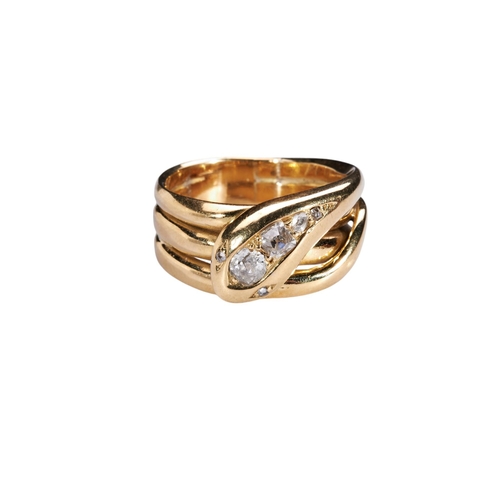 237 - A LATE VICTORIAN DIAMOND AND GOLD SNAKE RING, CIRCA 1880the coiled snake with four graduating old cu... 