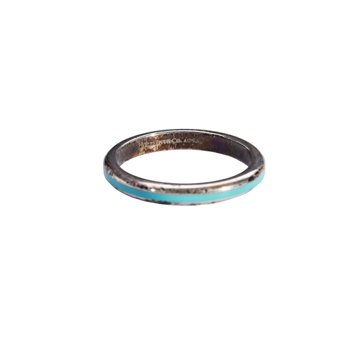 355 - TIFFANY & Co; AN ENAMEL AND SILVER RINGWith blue enamel.Marked ‘Tiffany & Co AC 925’With Tif... 