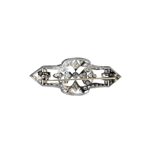 354 - ART DECO DIAMOND BROOCH, CIRCA 1930the central brilliant-cut diamond collet within a pierced geometr... 