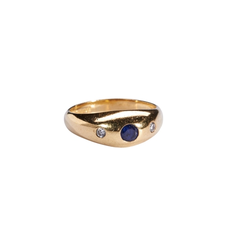 339 - A SAPPHIRE, DIAMOND AND 18 CARAT GOLD RINGthe circular mixed-cut sapphire between two brilliant-cut ... 