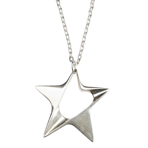 357 - A GEORGE JENSEN SILVER STAR PENDANT, on a silver chainDesigned by Henning Koppel, 1972Hallmarked 'GL... 