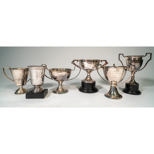 53 - A COLLECTION OF NINE OSCAR MOORE TROPHY CUPS Gifted to Formula 2 racer Oscar Moore in period. In rec... 