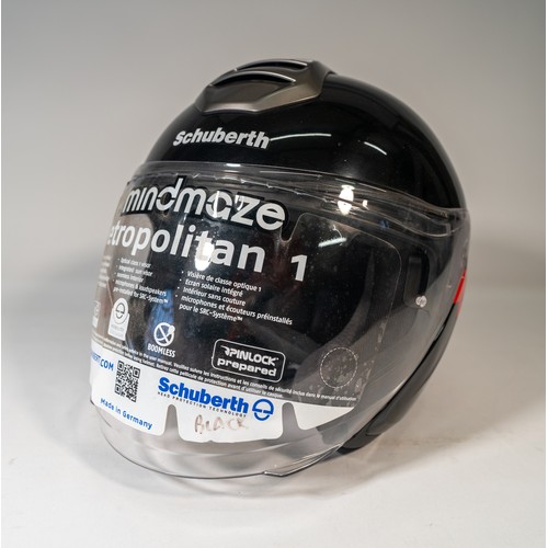 121 - A 'HAAS' F1 SCHUBERTH PIT CREW HELMETA Haas F1 Schuberth Pit Crew Helmet with Haas FI decal, black f... 