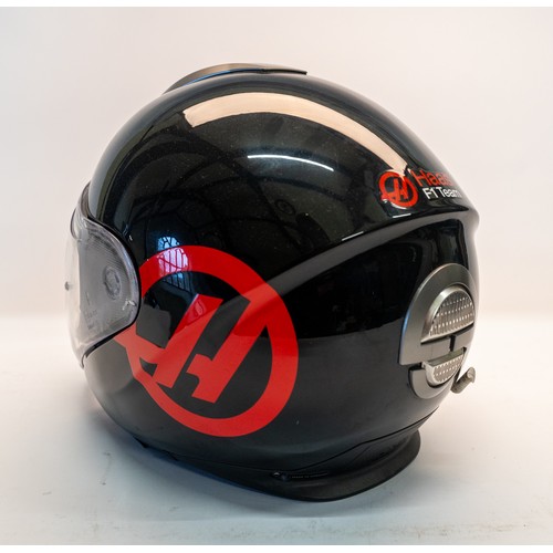 121 - A 'HAAS' F1 SCHUBERTH PIT CREW HELMETA Haas F1 Schuberth Pit Crew Helmet with Haas FI decal, black f... 