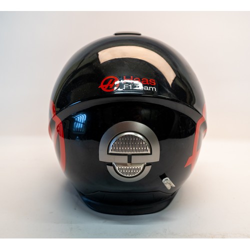 121 - A 'HAAS' F1 SCHUBERTH PIT CREW HELMETA Haas F1 Schuberth Pit Crew Helmet with Haas FI decal, black f... 