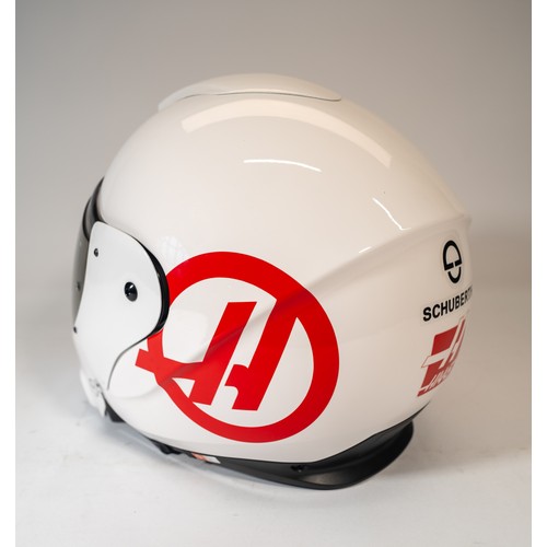 122 - A 'HAAS' F1 SCHUBERTH PIT CREW HELMETA Haas F1 Schuberth Pit Crew Helmet with Haas FI decal, white f... 