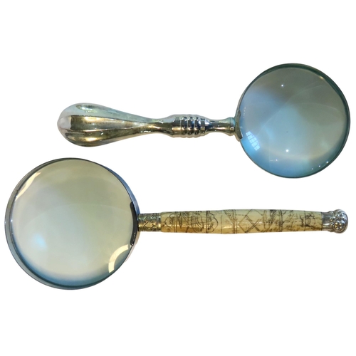 437 - A BONE HANDLED MAGNIFYING GLASS AND A PLATED HANDLED MAGNIFYING GLASS, the bone handle carved with f... 