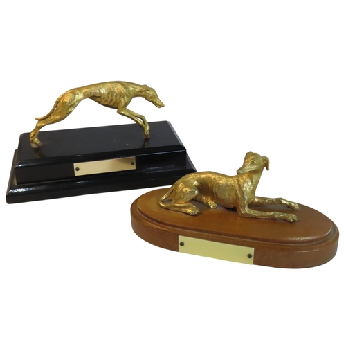 317 - TWO GILDED LACQUERED GREYHOUND MODELS, 20TH CENTURY, one modelled in outstretched pose, the other re... 