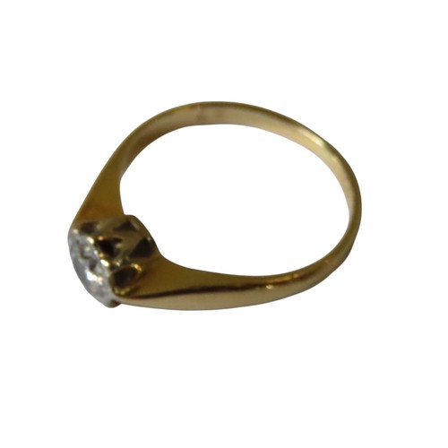 355 - A GOLD SOLITAIRE DIAMOND RING, stamped 18ct on the shank, the diamond held in a decorative settingUK... 