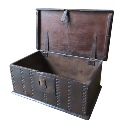 38 - AN OAK BIBLE BOX, 18TH CENTURY, rectangular form with iron lock plate and hinges with bands of notch... 