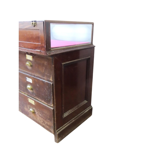 51 - A LARGE VINTAGE HABERDASHER'S SHOP COUNTER, the painted panelled pine base unit comprised of an arra... 