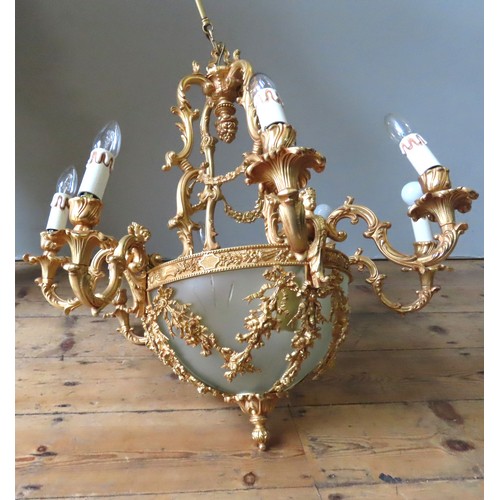 78 - A FINE ITALIAN NINE LIGHT CHANDELIER, 20TH CENTURY, the ornate lacquered brass scroll foliate frame ... 