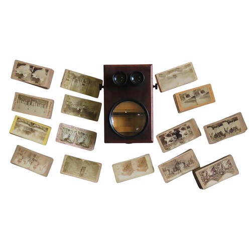 452 - A VINTAGE TABLE TOP STEREOSCOPE, LATE 19TH CENTURY, in a rectangular case, opening to reveal an ease... 