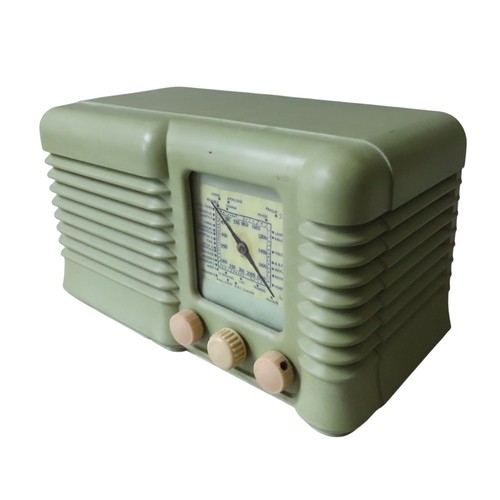 433 - A VINTAGE WHITLEY ELECTRICAL VALVE RADIO, in an attractive pale green Bakelite case with ribbed desi... 