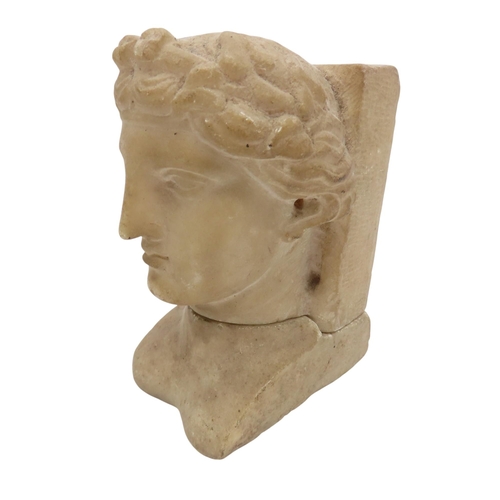 324 - A NEO-CLASSICAL MARBLE HEAD AFTER THE ANTIQUE, in two parts, probably a fireplace corbel, 19th centu... 