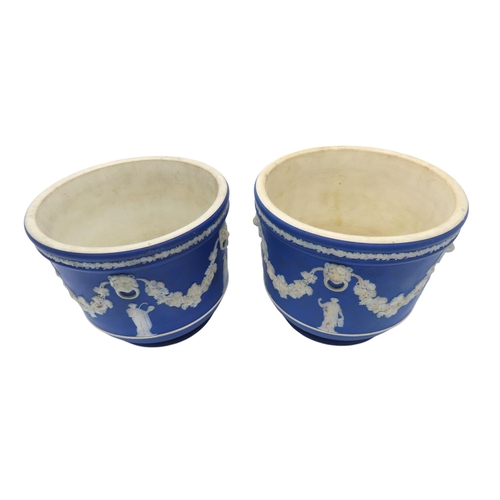 188 - A WEDGWOOD BLUE JASPER WARE SQUAT PEDESTAL AND A PAIR OF WEDGWOOD BLUE JASPER CACHE POTS21cm max... 