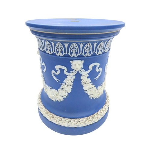 188 - A WEDGWOOD BLUE JASPER WARE SQUAT PEDESTAL AND A PAIR OF WEDGWOOD BLUE JASPER CACHE POTS21cm max... 