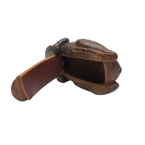 313 - A WOODEN SNUFF/TOBACCO BOX in the form of a toad, the base opening on a wooden hinge, the eyes inali... 