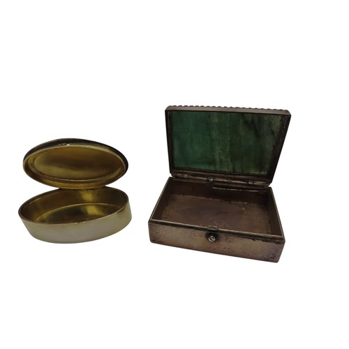 307 - A WHITE METAL 'PILL' BOX WITH GREEN AGATE INSET LID and an oval circular silver box with yellow enam... 