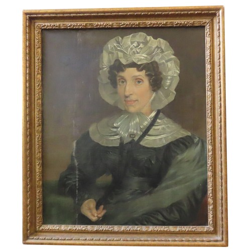 286 - VICTORIAN PORTRAIT OF A LADY wearing a bonnet, oil on canvas and in gilt gesso frame. 75 x 62 cms