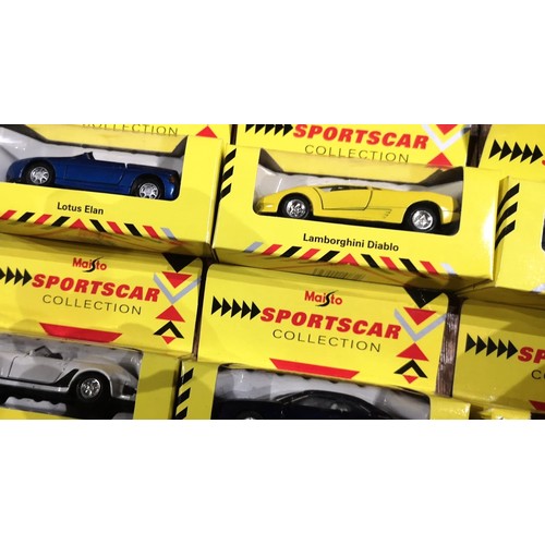 158 - A COLLECTION OF OVER 20 BOXED MODEL CARSIncluding 1:36 Maisto models for the Shell Sportscar colleci... 