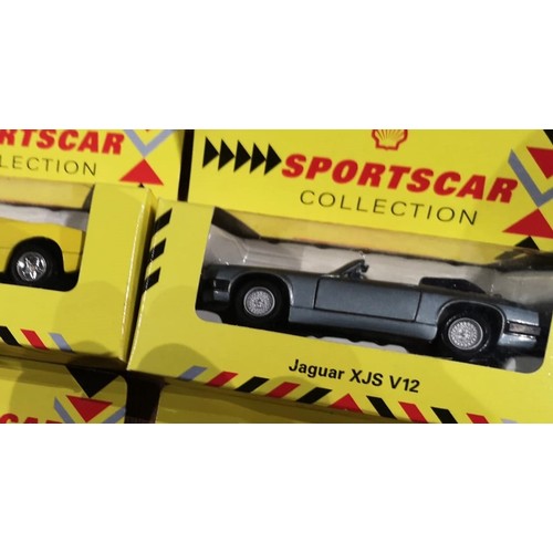 158 - A COLLECTION OF OVER 20 BOXED MODEL CARSIncluding 1:36 Maisto models for the Shell Sportscar colleci... 