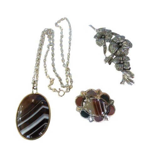 511 - AN OVAL AGATE PENDANT ON SILVER CHAIN, SILVER AND HARDSTONE BROOCH AND A MARQUISITE BROOCH, the chai... 