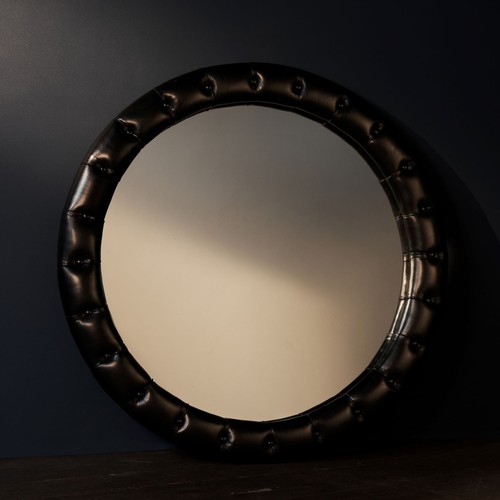 517 - UNUSUAL BUTTONED BLACK LEATHER WALL MIRRORCIRCA 1940'S117cm diamPROVENANCE: Private London Collectio... 