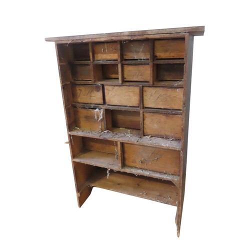 91 - A MAHOGANY 19TH CENTURY APOTHECARY CABINET, comprised of an array of 16 graduated drawers above a pa... 