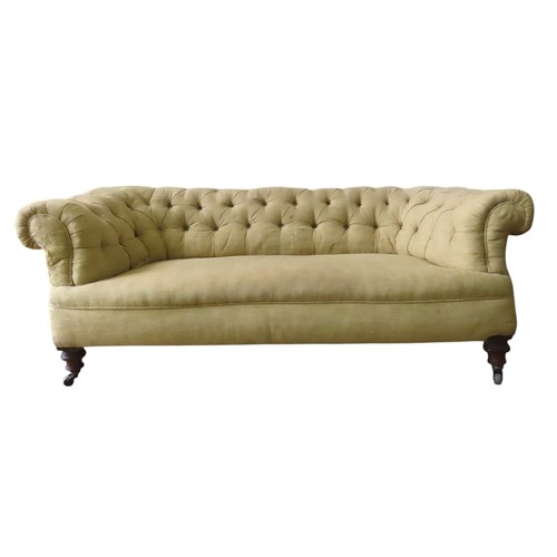 4 - A BUTTON UPHOLSTERED CHESTERFIELD SETTEE, LATE 19TH CENTURY, with scroll arms, covered in a gold dam... 