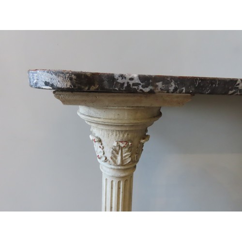 27 - A PAINTED WOODEN MARBLE TOP CONSOLE TABLE, the rectangular marble slab supported by twin Corinthian ... 