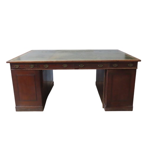 26 - A MID VICTORIAN MAHOGANY PARTNER'S DESK, the rectangular top inset with a gilt tooled leather writin... 