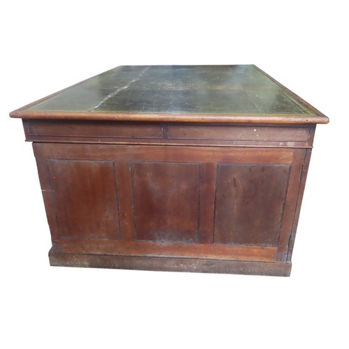 26 - A MID VICTORIAN MAHOGANY PARTNER'S DESK, the rectangular top inset with a gilt tooled leather writin... 