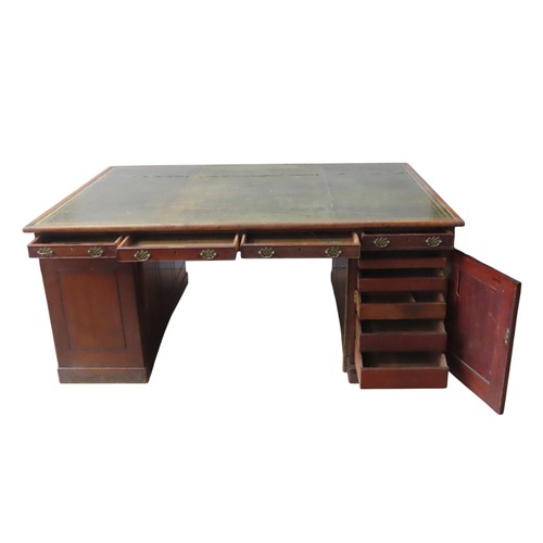 26 - A MID VICTORIAN MAHOGANY PARTNER'S DESK, the rectangular top inset with a gilt tooled leather writin... 