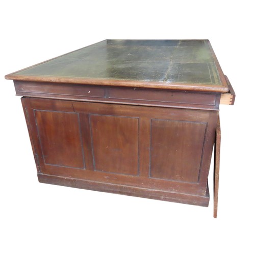 26 - A MID VICTORIAN MAHOGANY PARTNER'S DESK, the rectangular top inset with a gilt tooled leather writin... 