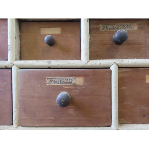 85 - A LARGE BANK OF PINE SEED MERCHANT'S DRAWERS, LATE 19TH CENTURY, in two sections, each section compr... 